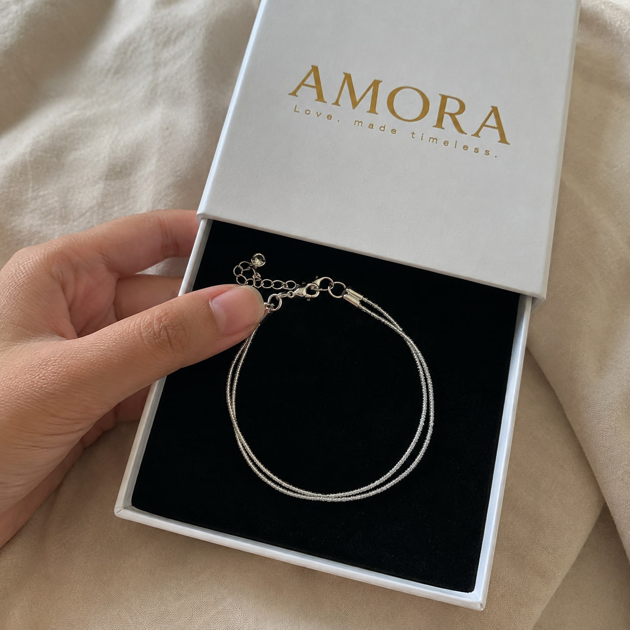 Customer unboxing anklet